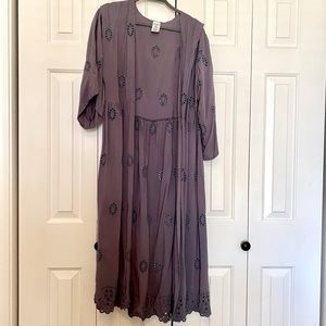 Purple womens cover up for swimwear/ leisure.